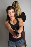 OXANA AND XENIA STANDING POSE WITH GUNS 3 (4)